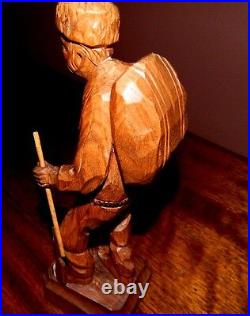 Antique woodcarving, Quebec artist, Paul E. Caron. Old Hunter with rifle, Canada