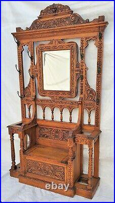 English North Wind Carved Oak Hall Seat / Hall Tree Mirror Hooks & Storage Bench