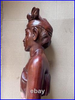 This is a hand-carved vintage Balinese wood bust sculpture