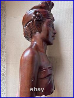 This is a hand-carved vintage Balinese wood bust sculpture