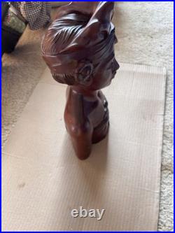 This is a hand-carved vintage Balinese wood bust sculpture