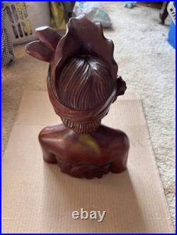 This is a hand-carved vintage Balinese wood bust sculpture
