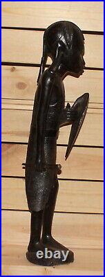 Vintage African hand carving wood warrior statuette