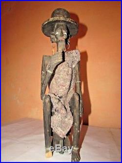 Vintage Hand Carved Wood African Sculpture terrifying Statue Man