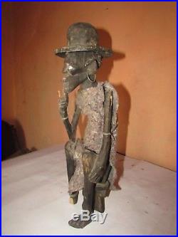 Vintage Hand Carved Wood African Sculpture terrifying Statue Man