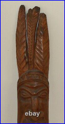 Vintage Indian man hand carving wood statuette