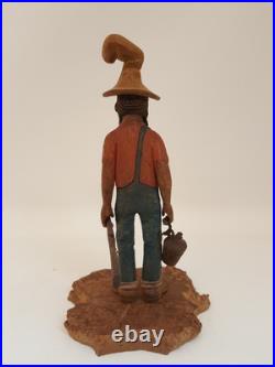 Vintage folk art hand carved wood sculpture old moonshiner man whiskey gun KK 88