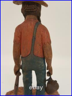 Vintage folk art hand carved wood sculpture old moonshiner man whiskey gun KK 88