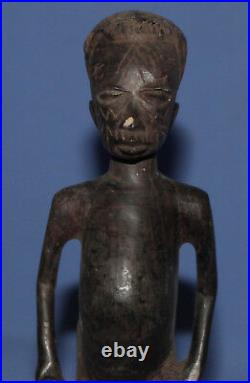 Vintage hand carved wood African man statuette