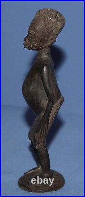 Vintage hand carved wood African man statuette