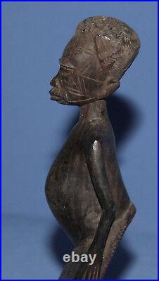 Vintage hand carved wood African man statuette