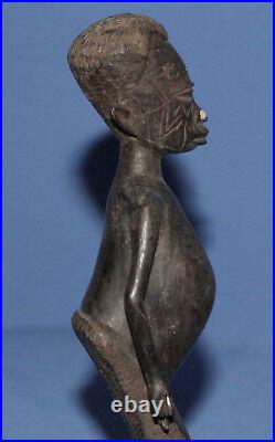 Vintage hand carved wood African man statuette