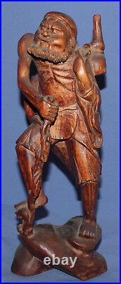 Vintage hand carved wood Asian old man statuette