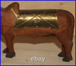 Vintage hand carved wood cattle figurine with brass ornaments
