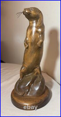 Vintage hand carved wood metal standing sea otter animal sculpture statue figure
