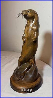 Vintage hand carved wood metal standing sea otter animal sculpture statue figure