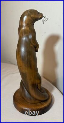 Vintage hand carved wood metal standing sea otter animal sculpture statue figure