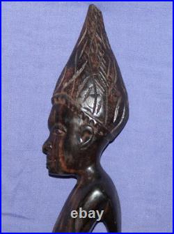 Vintage hand carved wood tribal statuette