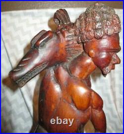 Vintage hand carved wood tribal warrior with alligator figurine