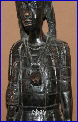 Vintage hand carving wood African hunter statuette