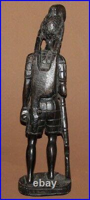 Vintage hand carving wood African hunter statuette