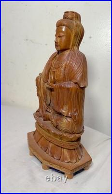Vintage intricate hand carved wood Balinese Guanyin Buddha statue sculpture art