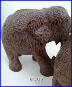 Vintage pair of wood elephants elephant sculpture wooden statue handcarved craft
